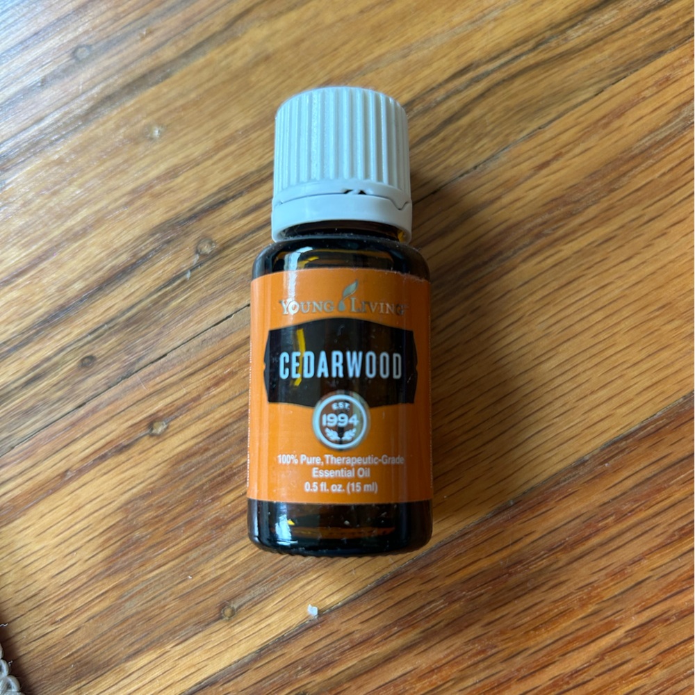 Young Living Cedarwood Essential Oil - Vibrant Orange and Subtle Gray